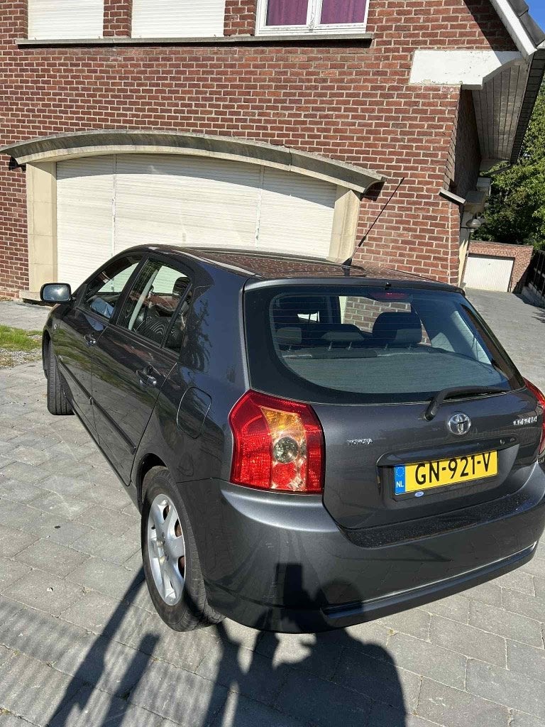 Toyota Corolla Silver, 1.4 VVT-i - AIRCO 2006 KM 83000 97PK, Auto's, Toyota, Voorwielaandrijving, Euro 5, Stof, Elektrische ramen