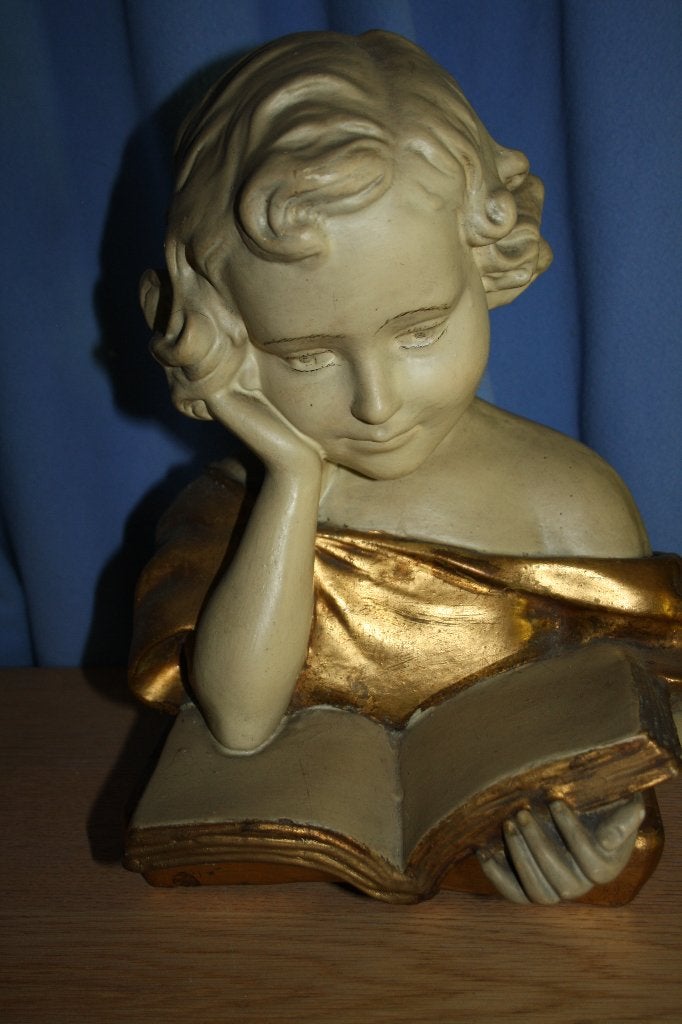 buste en platre enfant, Enlèvement