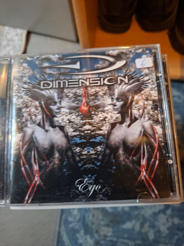 cd - dimension - ego, Ophalen of Verzenden, Zo goed als nieuw, Album, Inclusief boekje