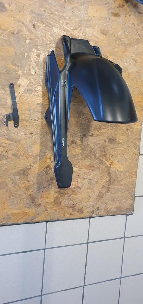 Achterspatbord, Motoren, Ophalen