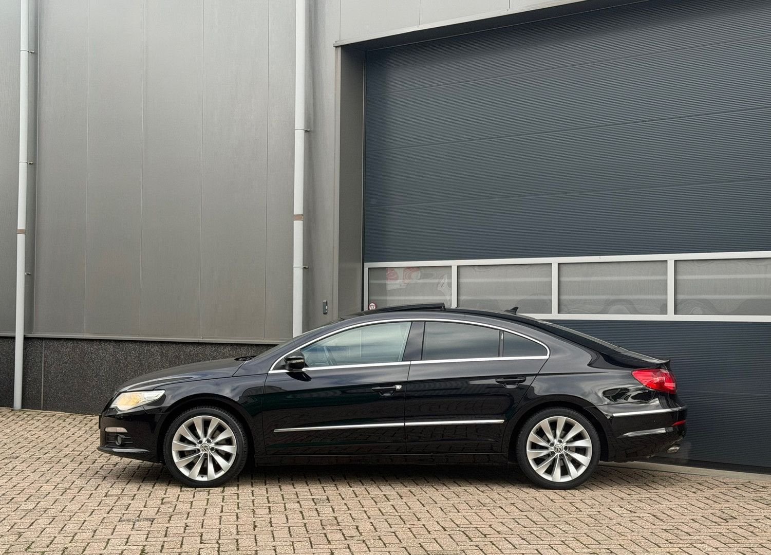 Volkswagen Passat CC 1.8 TSI 4p. Bj.2010 Pano|Navi|Pdc|Nap., Auto's, Passat CC, Zwart, 178 g/km, Grijs