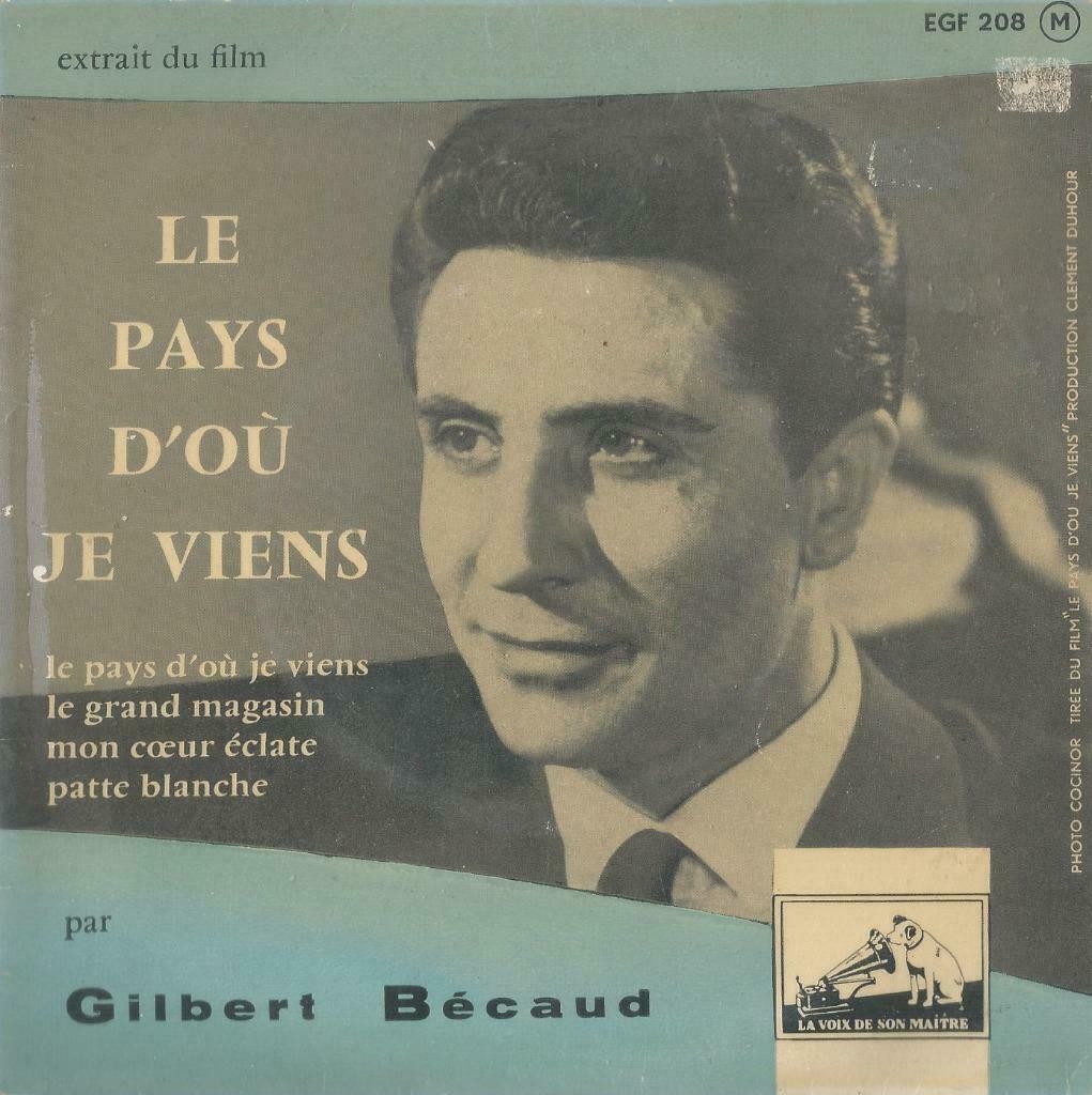 Gilbert Bécaud – Le pays d’ou je viens / Le grand magasin +, Enlèvement ou Envoi, Utilisé, Pop, 7 pouces