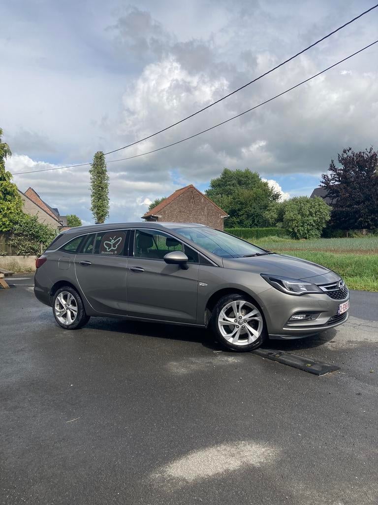 Opel Astra K Sports Tourer 1.4 essence 125ch, Autos, Opel, Cuir, Argent ou Gris, Boîte manuelle, 5 portes