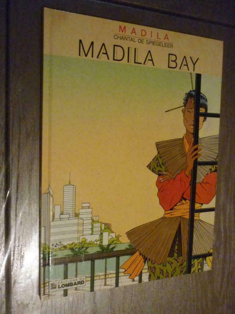 madila bay 1 madila E O, Eén stripboek, Ophalen of Verzenden, Zo goed als nieuw