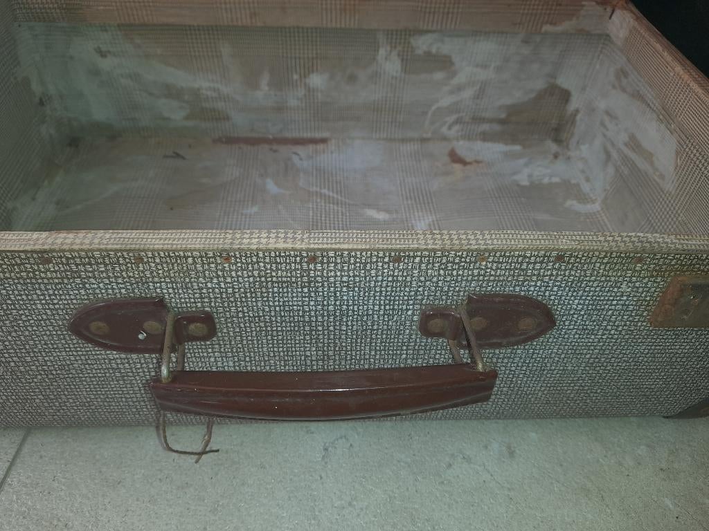 Vintage reiskoffer, Ophalen