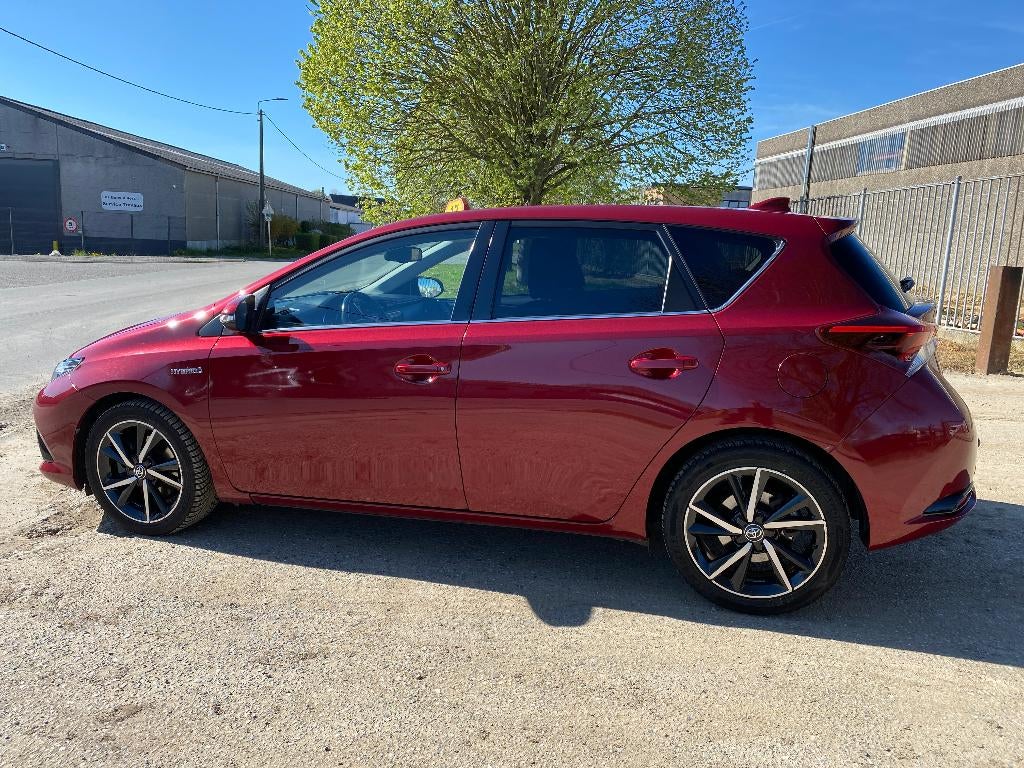 Toyota Auris HEV 1.8i HSD Style E-CVT, Auto's, Stof, https://public.car-pass.be/vhr/b39c3112-e2d9-4da0-b2db-938f933d2d4d, 4 cilinders