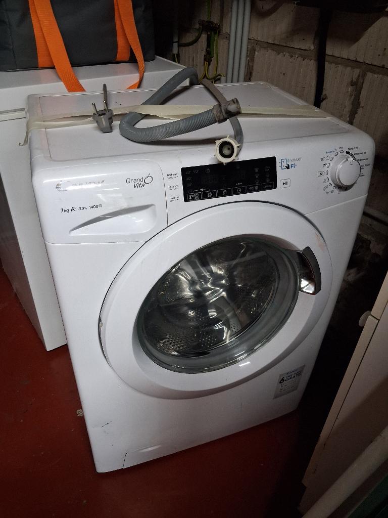 Wasmachine candy 7 kilo, Ophalen