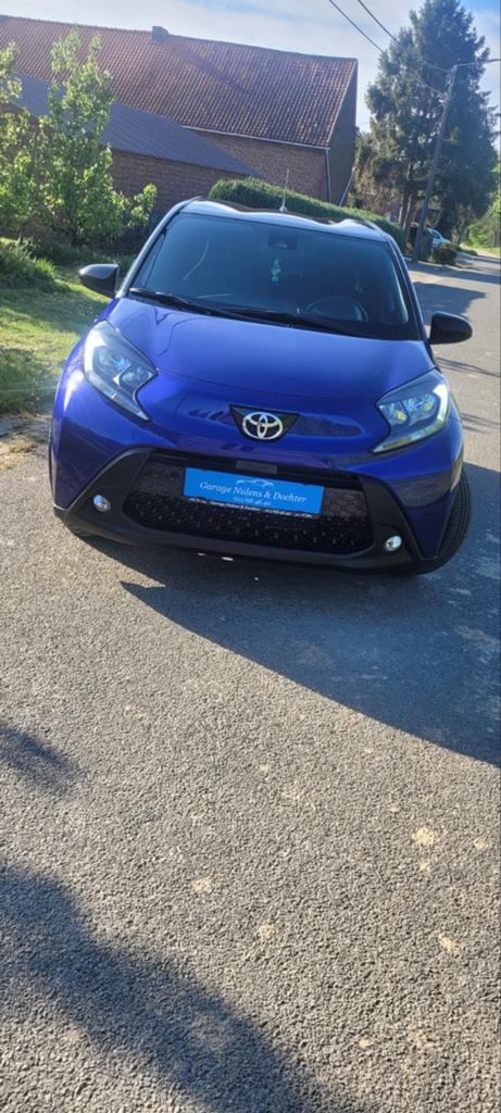 Toyota Aygo X Pulse 998CC, 72PK, met 13360 km Automaat, 2024, Auto's, Blauw, 5 zetels, 5 deurs, 3 cilinders