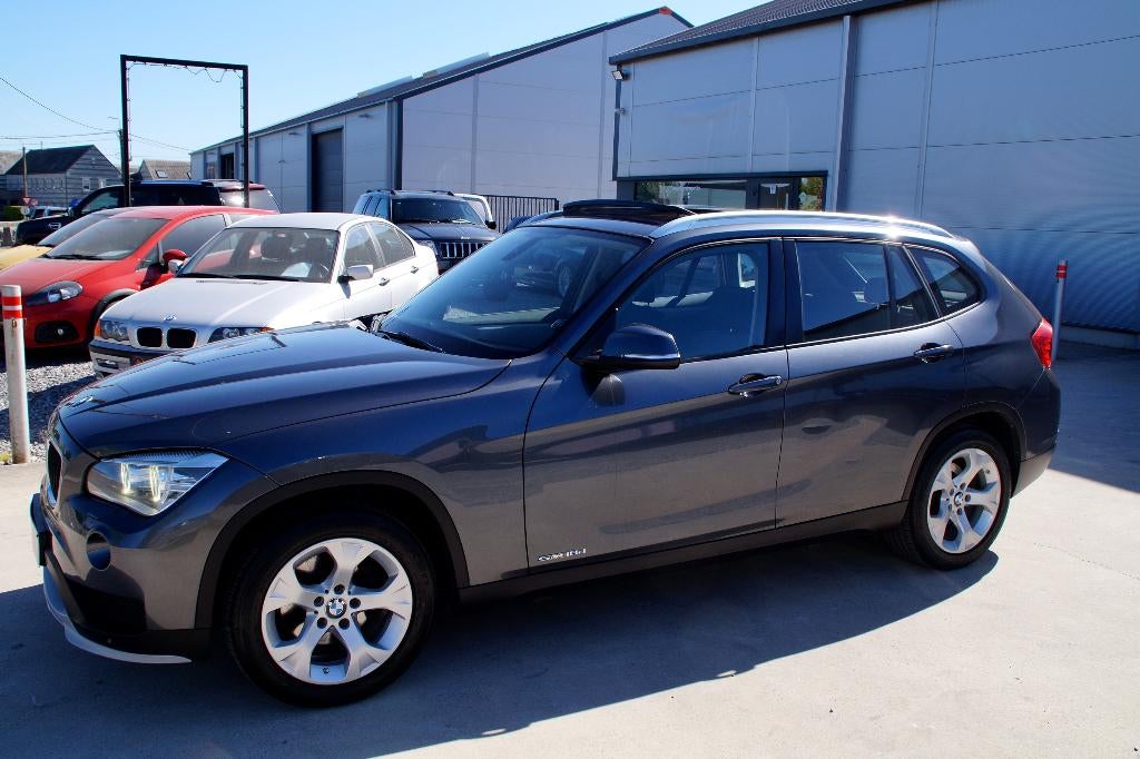 BMW X1 2.0 dA sDrive18 _Garantie, Auto's, Stof, 1995 cc, Zwart, 4 cilinders