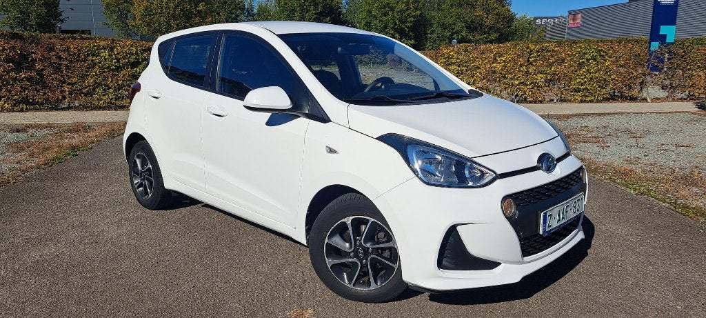 Hyundai I10 benz. navigatie - 2018 - gekeurd, Auto's, Voorwielaandrijving, Dealer onderhouden, Stof, Wit