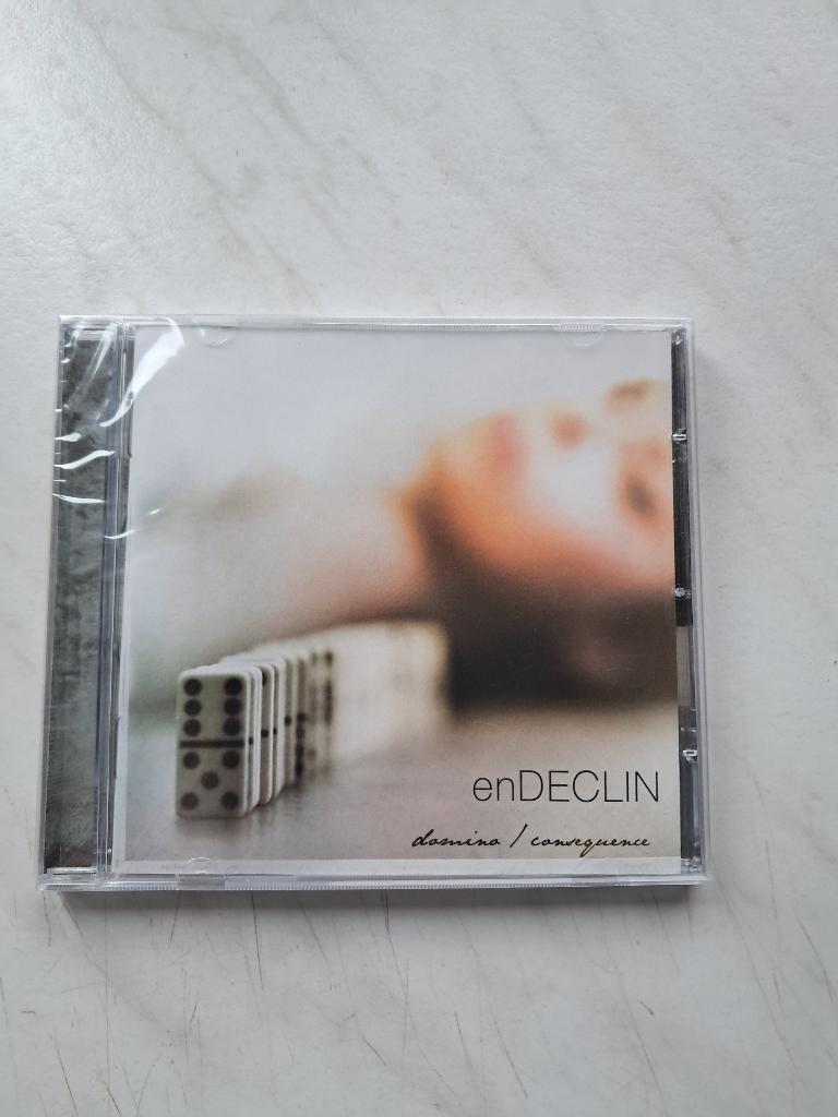 En Declin : Domino / Consequence (CD) progrock, Ophalen of Verzenden