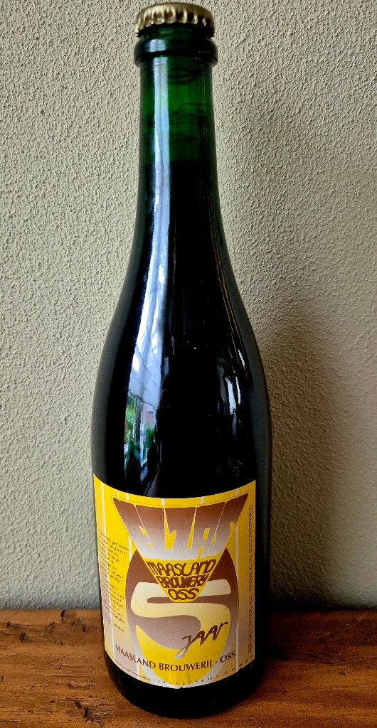 Fles St. Jaar speciaal bier Maasland Brouwerij Oss verzamel, Verzamelen, Ophalen of Verzenden, Zo goed als nieuw, Flesje(s)