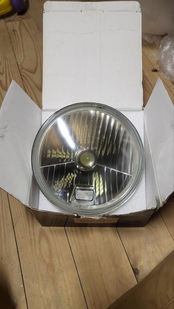 Originele koplamp Interceptor 650, Ophalen