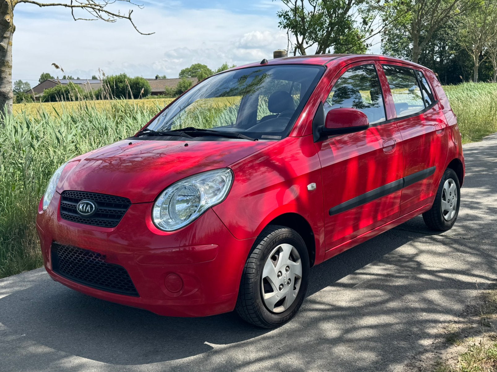 Kia Picanto easy 1.0i Benzine 69.000km, Auto's, Voorwielaandrijving, Zwart, Leder, Handgeschakeld