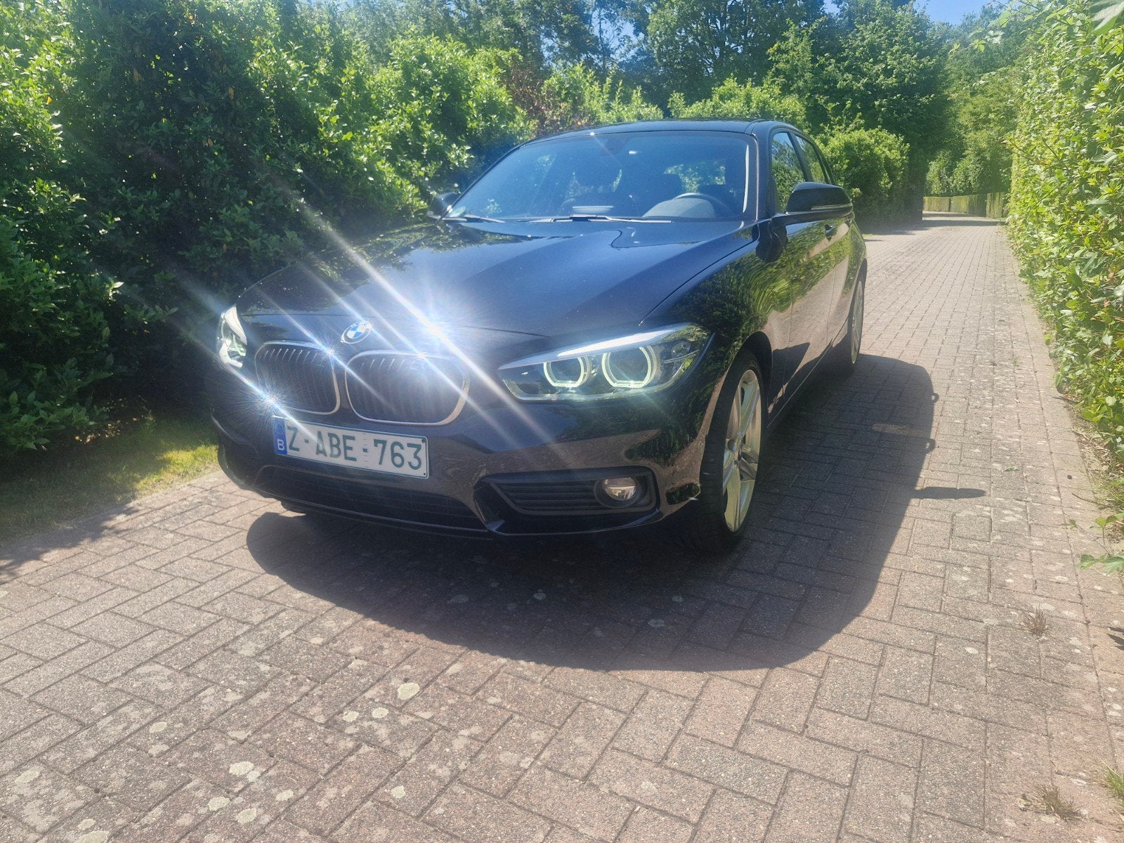 Bmw 116i 2016 euro6 benzine 94dkm gekeurd en 1jgarantie, Auto's, Zwart, Electronic Stability Program (ESP), 5 deurs, 3 cilinders