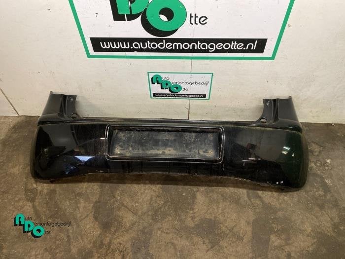 Achterbumper van een Mitsubishi Colt (Colt 04-) (08H), Gebruikt, -, -, Ophalen of Verzenden