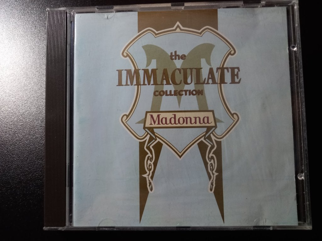 Madonna ‎– The Immaculate Collection - CD = Als nieuw !, Inclusief boekje, Pop, Ophalen of Verzenden, Zo goed als nieuw