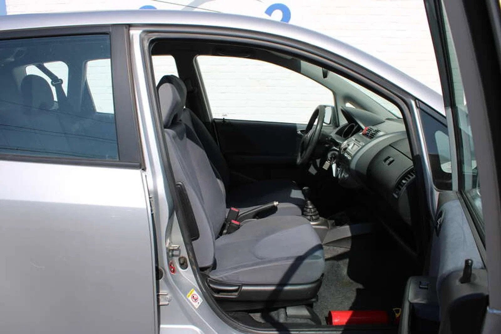 Honda Jazz Jazz 1.4i Airco/5Deurs 2 JAAR garantie (bj 2008), Auto's, Honda, Stof, 4 cilinders, Bedrijf, Zilver of Grijs