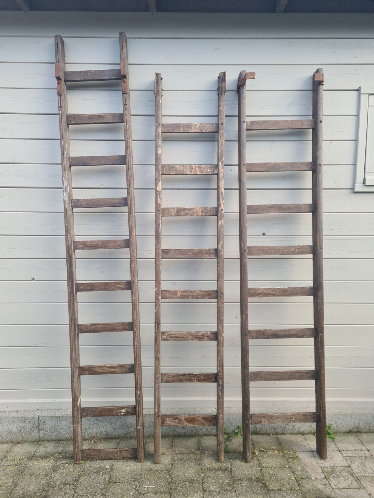 oude houten ladders ter decoratie, Ophalen