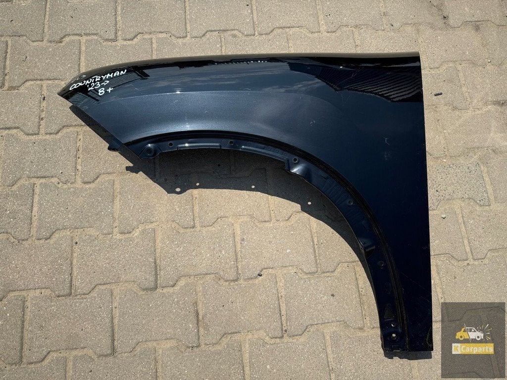 Mini Countryman III 23 - aile avant gauche, Customer.service@mini.co.uk, BMW AG, Petuelring 130
80788  Munich, DE, Mini