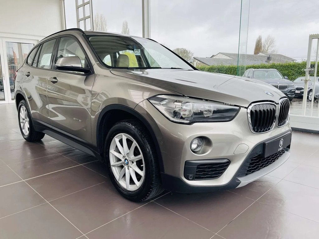 BMW X1 1.5iA * GARANTIE + GPS + CUIR * (bj 2016, automaat), Auto's, BMW, Gebruikt, Bruin, 124 g/km, Leder