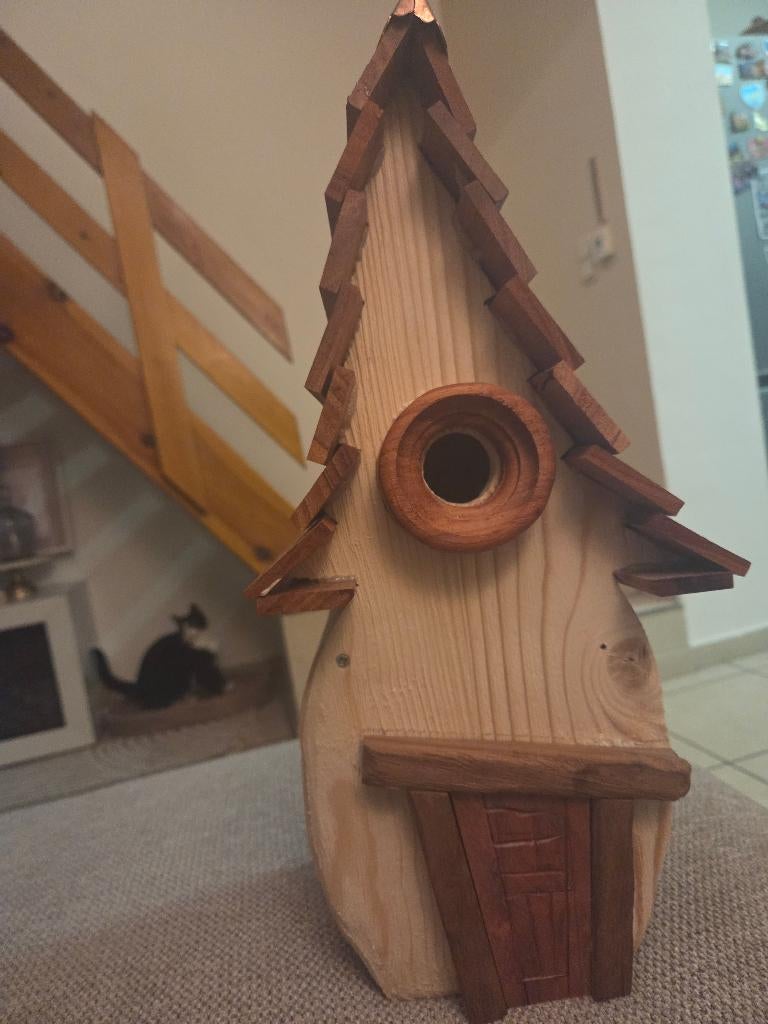 Zelfgemaakte vogelhuisje, Ophalen