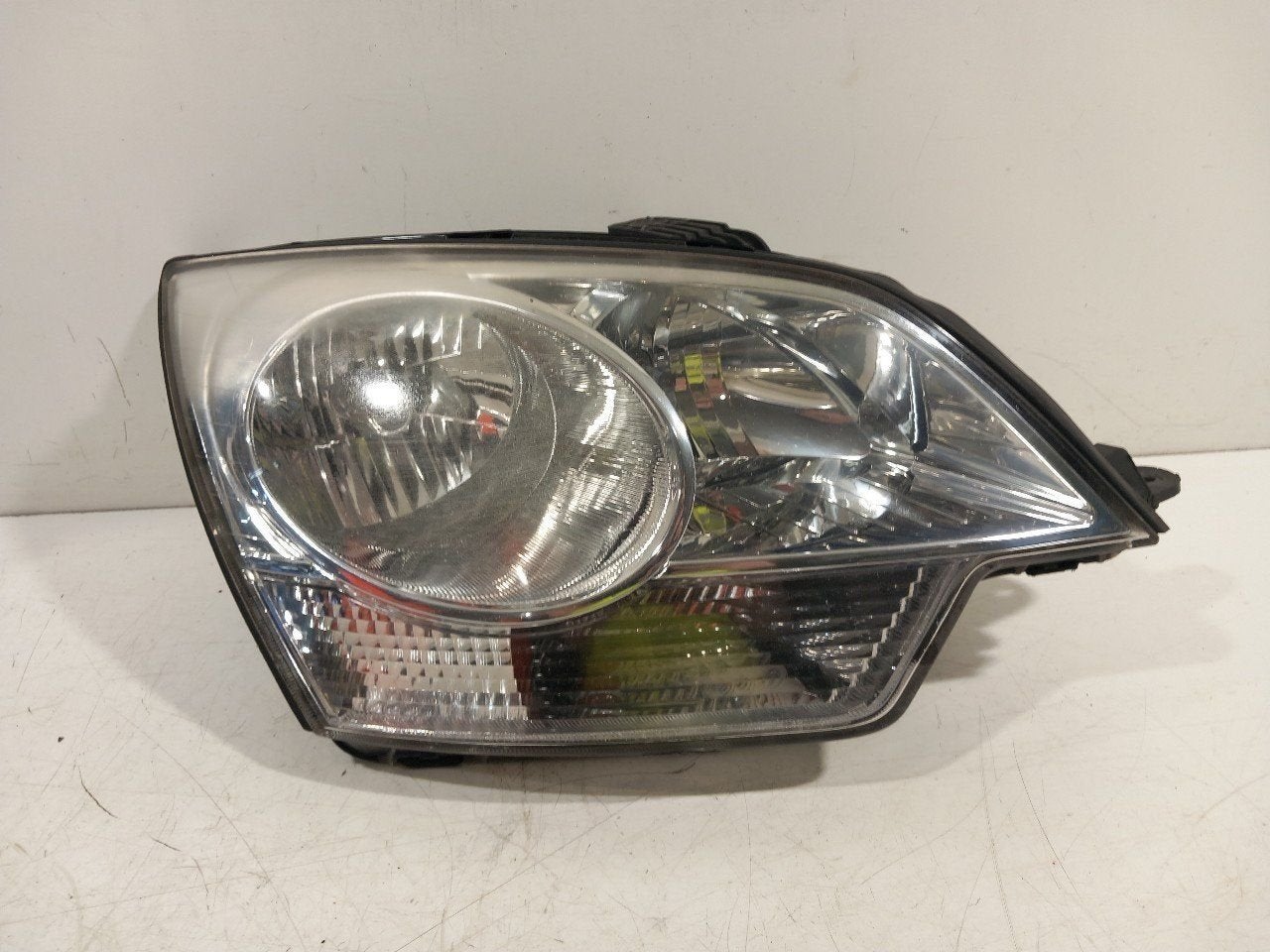 Koplamp rechts Opel Antara, Auto-onderdelen, Verlichting, Onderdelen@venauto.nl, Van der Ven Autorecycling B.V., Gebruikt, Ettenseweg 76, 4706 PB Roosendaal, The Netherlands