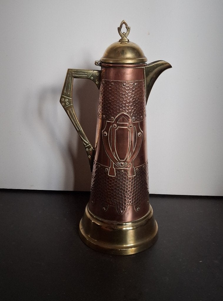 Art nouveau messing kan, Ophalen