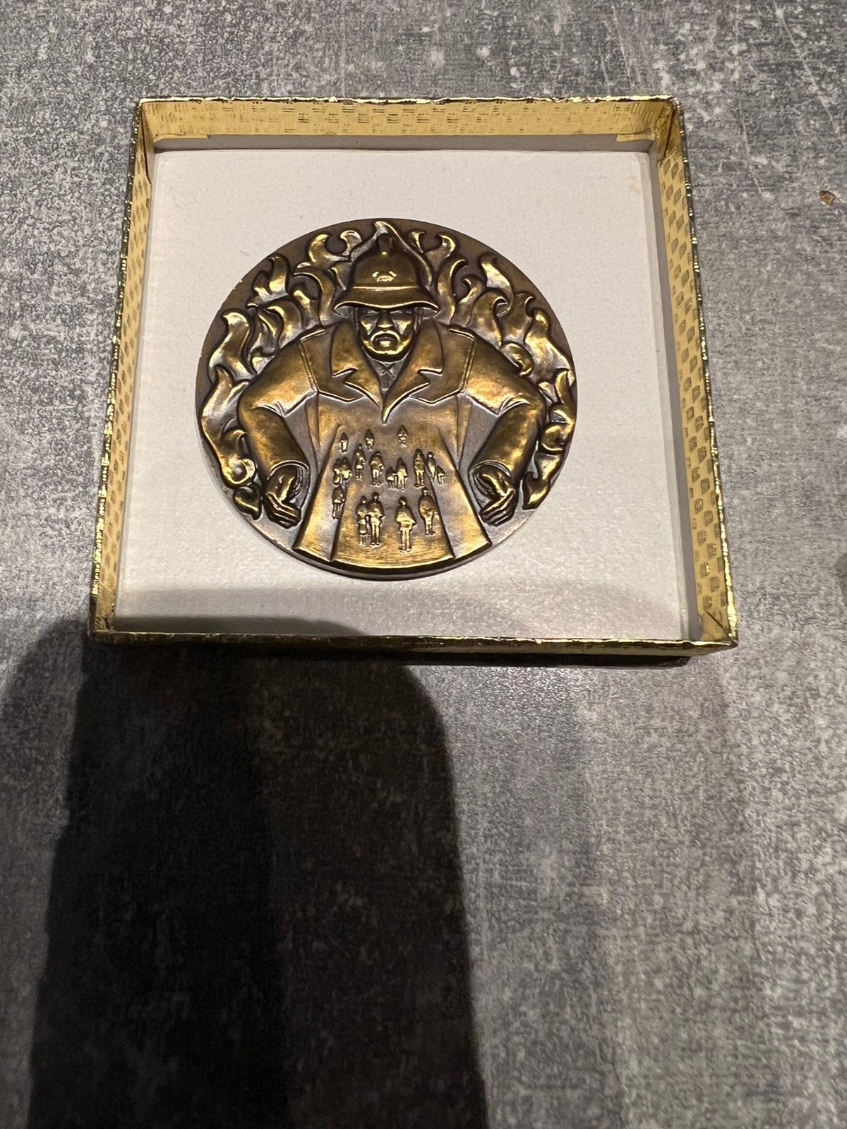 Bronzen Herdenkingsmunt 175 jaar brandweer Gent, Ophalen