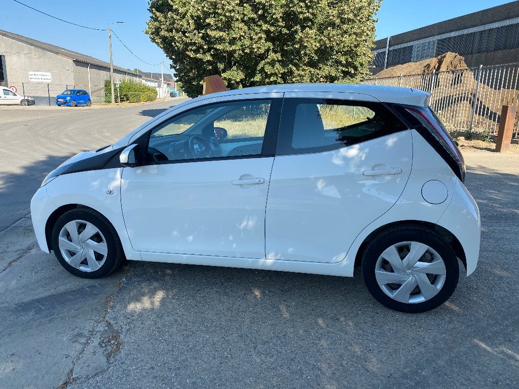 Toyota Aygo 1.0i VVT-i x-play Automatique, Auto's, Toyota, Stof, Wit, Bedrijf, 3 cilinders