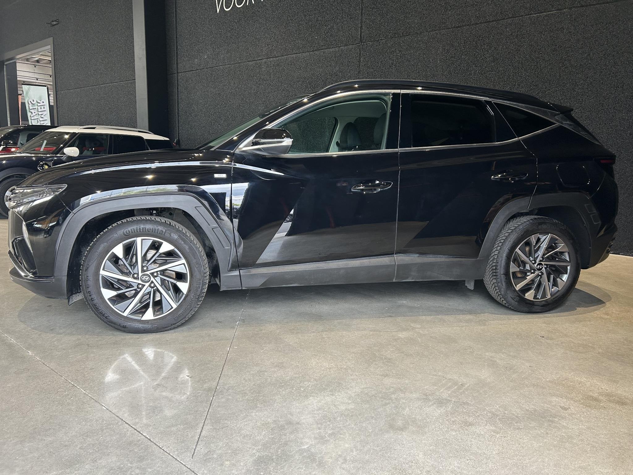 Hyundai Tucson 1.6 T-GDi 48V Feel CAMERA | Zetelverwarming |, Voorwielaandrijving, Stof, Gebruikt, 110 kW