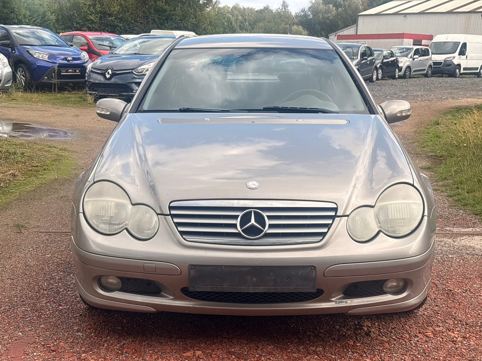 Mercedes C220 CDI Sport Coupé, Auto's, 100 kW, Zwart, 1505 kg, Beige
