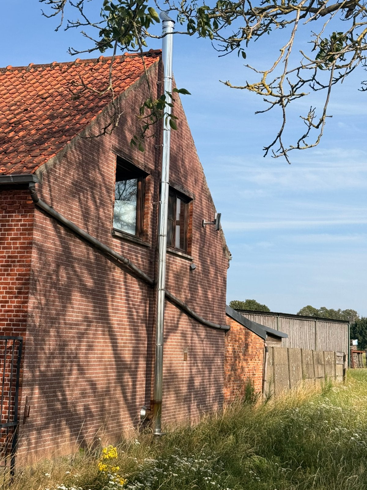 Inox schouw voor houtkachel, Maison & Meubles, Poêles, Comme neuf, Enlèvement, Bois, Suspendu