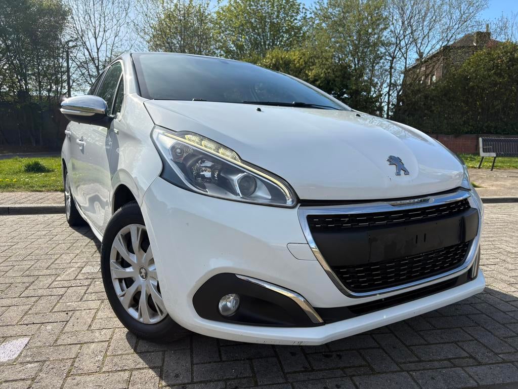 Peugeot 1.2 i benzine 1e eigenaar, Auto's, Euro 5, Stof, Zwart, Wit