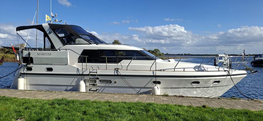 Let op motoryacht polyester Neptunus 108 twin expresse, Watersport en Boten, Ophalen, Elektrisch, Zo goed als nieuw, 12 meter of meer