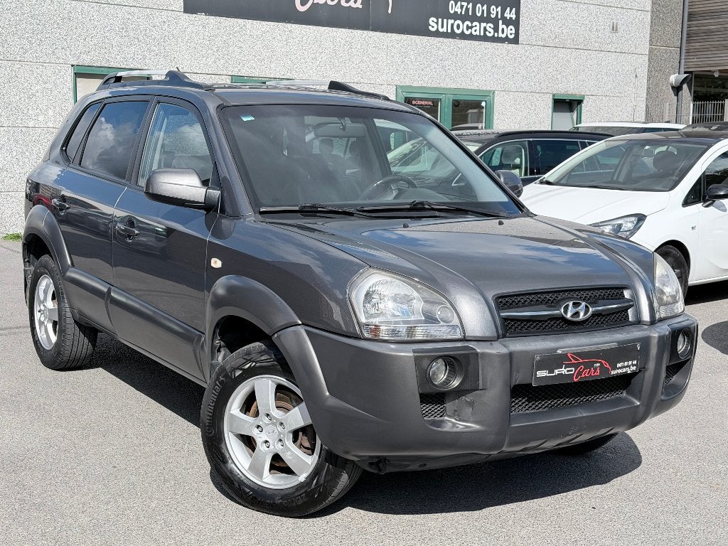 | Hyundai Tucson | Lichte Vracht | Automaat | Trekhaak |, Auto's, 1998 cc, Zwart, Bruin, Leder