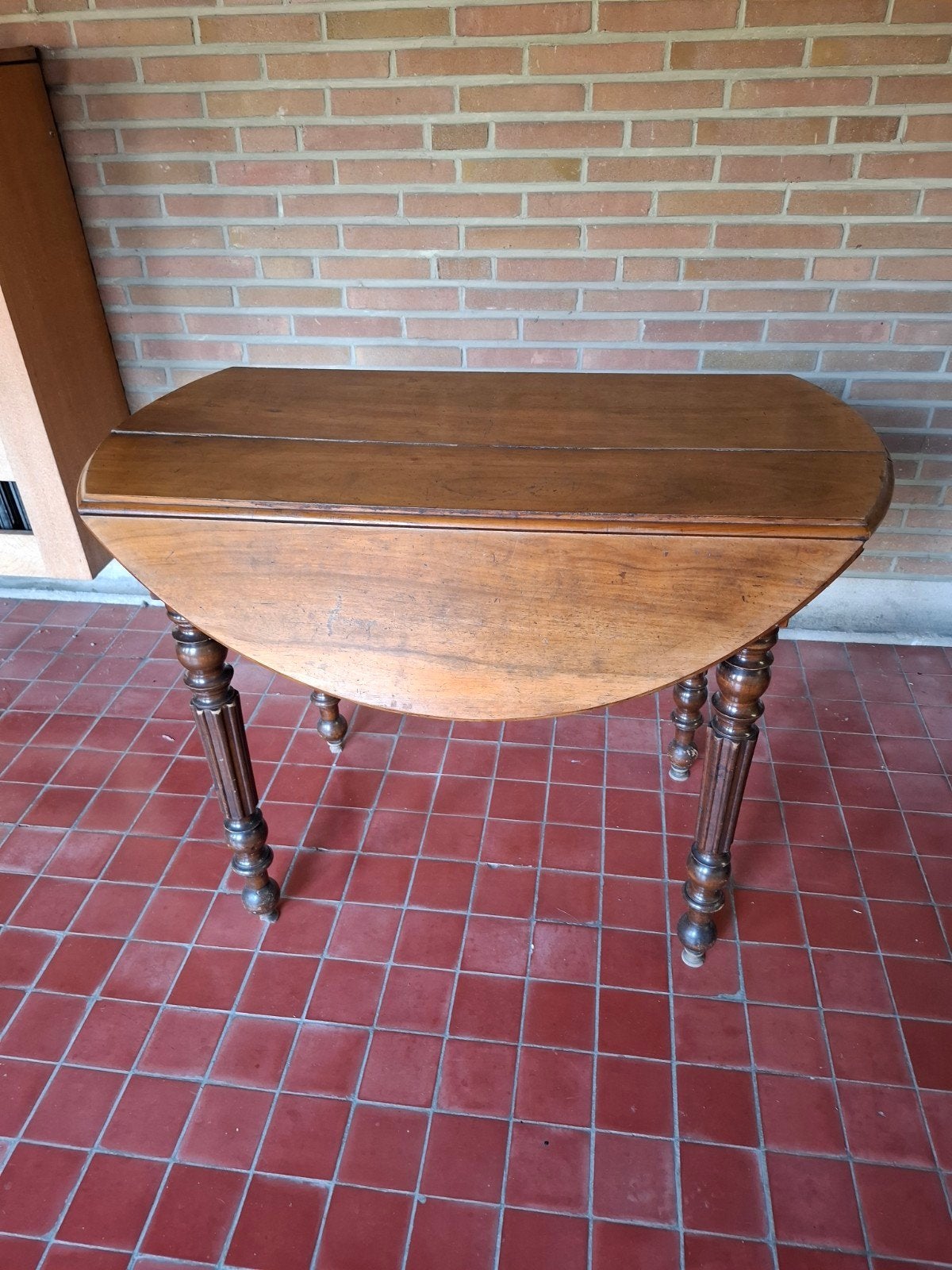 Ancienne table ovale à abattants en bois massif, Enlèvement