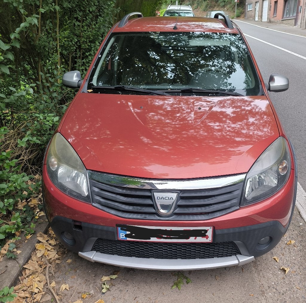 Dacia Sandero Stepway 2011 1.6 essence, Autos, Rouge, Euro 5, Boîte manuelle, 1137 kg