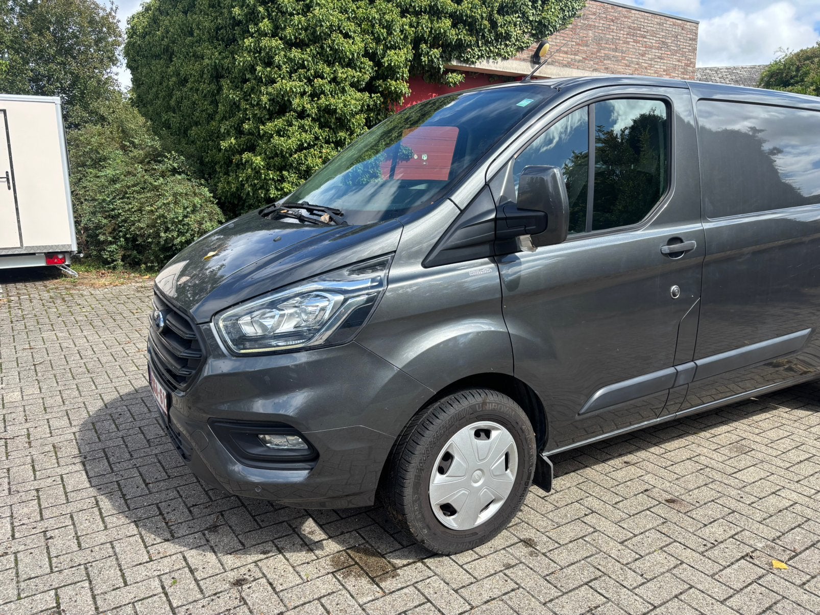 Ford Transit Custom L2H1 130pk, Auto's, Bestelwagens en Lichte vracht, Euro 6, Bedrijf, Ford, Zilver of Grijs