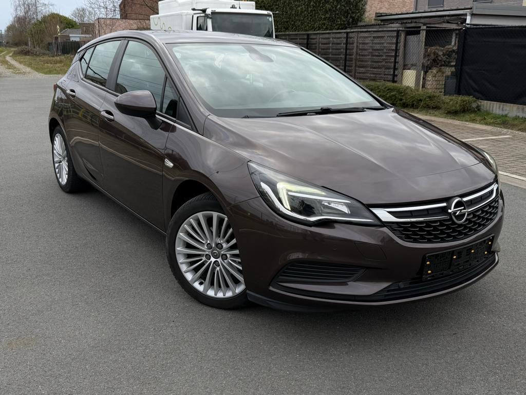 OPEL ASTRA 1.4 benzine |Gps| CRUISE| GARANTIE|, Auto's, Opel, Voorwielaandrijving, Stof, 4 cilinders, Bruin