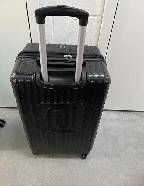 Valise disney noire, Enlèvement ou Envoi