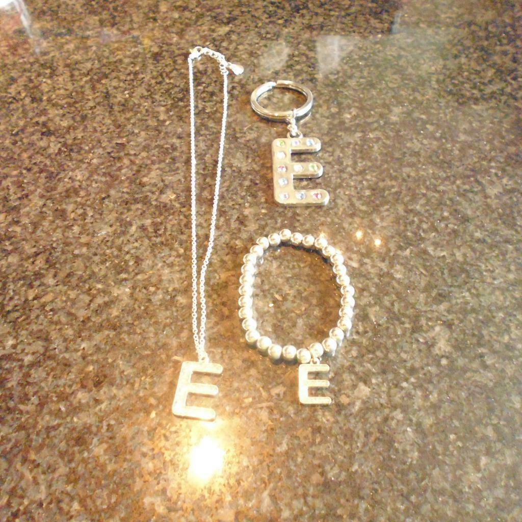 nieuwstaat juwelen de letter E, Handtassen en Accessoires, Overige Accessoires, Ophalen of Verzenden, Zo goed als nieuw
