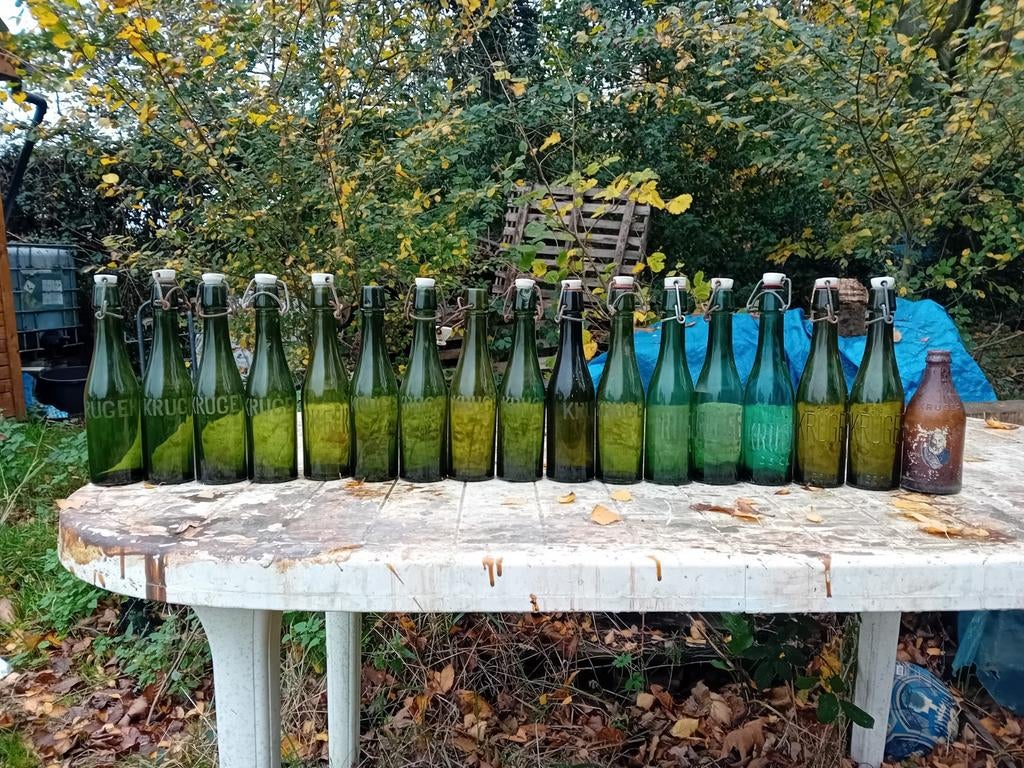 Oude vintage bierflessen brouwerij Kruger Eeklo, Ophalen of Verzenden, Gebruikt