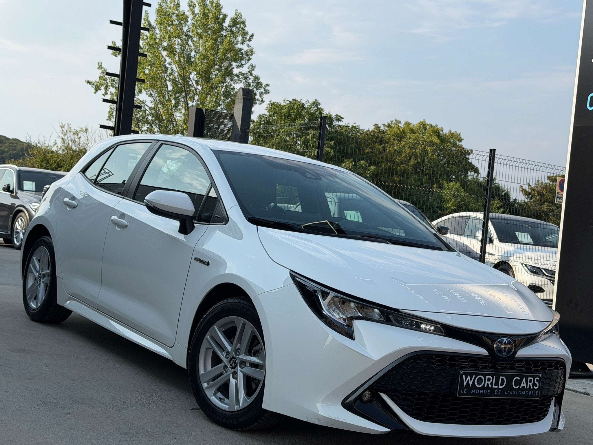 Toyota Corolla Corolla Hybrid 1.8 e-CVT CRUISE - CAMERA - LA, Auto's, Stof, Gebruikt, 4 cilinders, 72 kW
