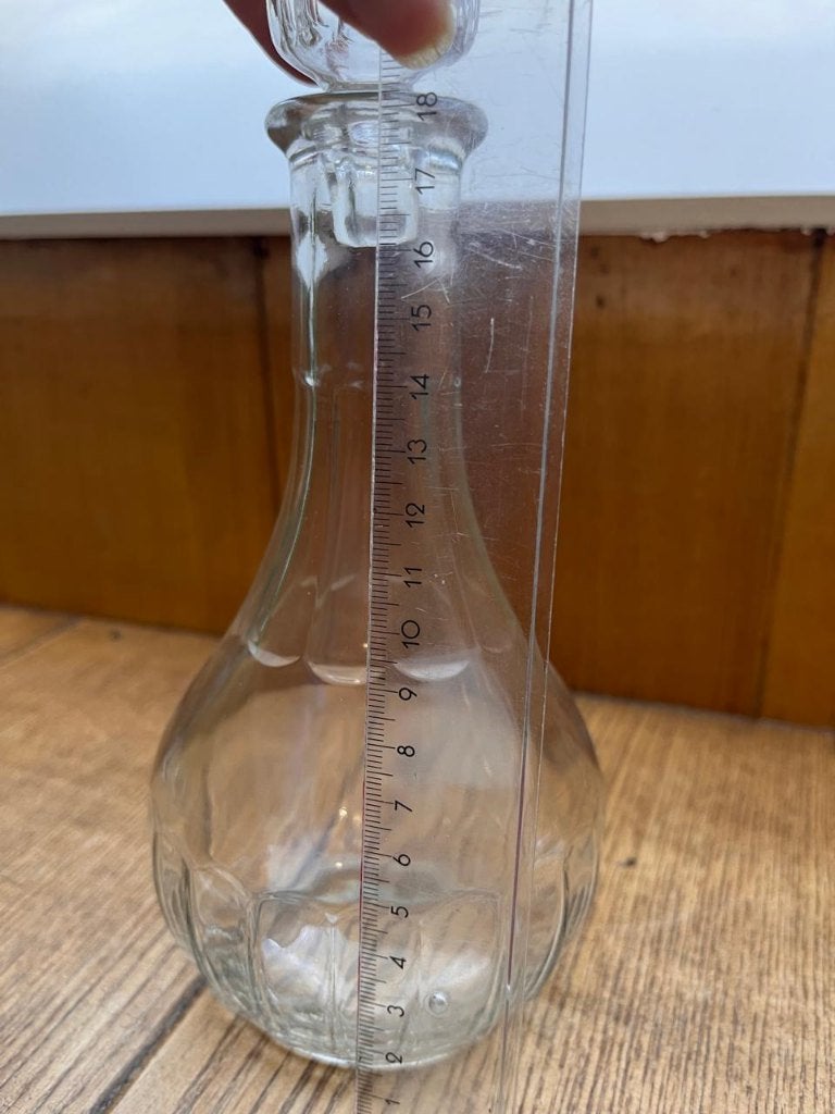 Bolvormige karaf in geslepen glas, Ophalen
