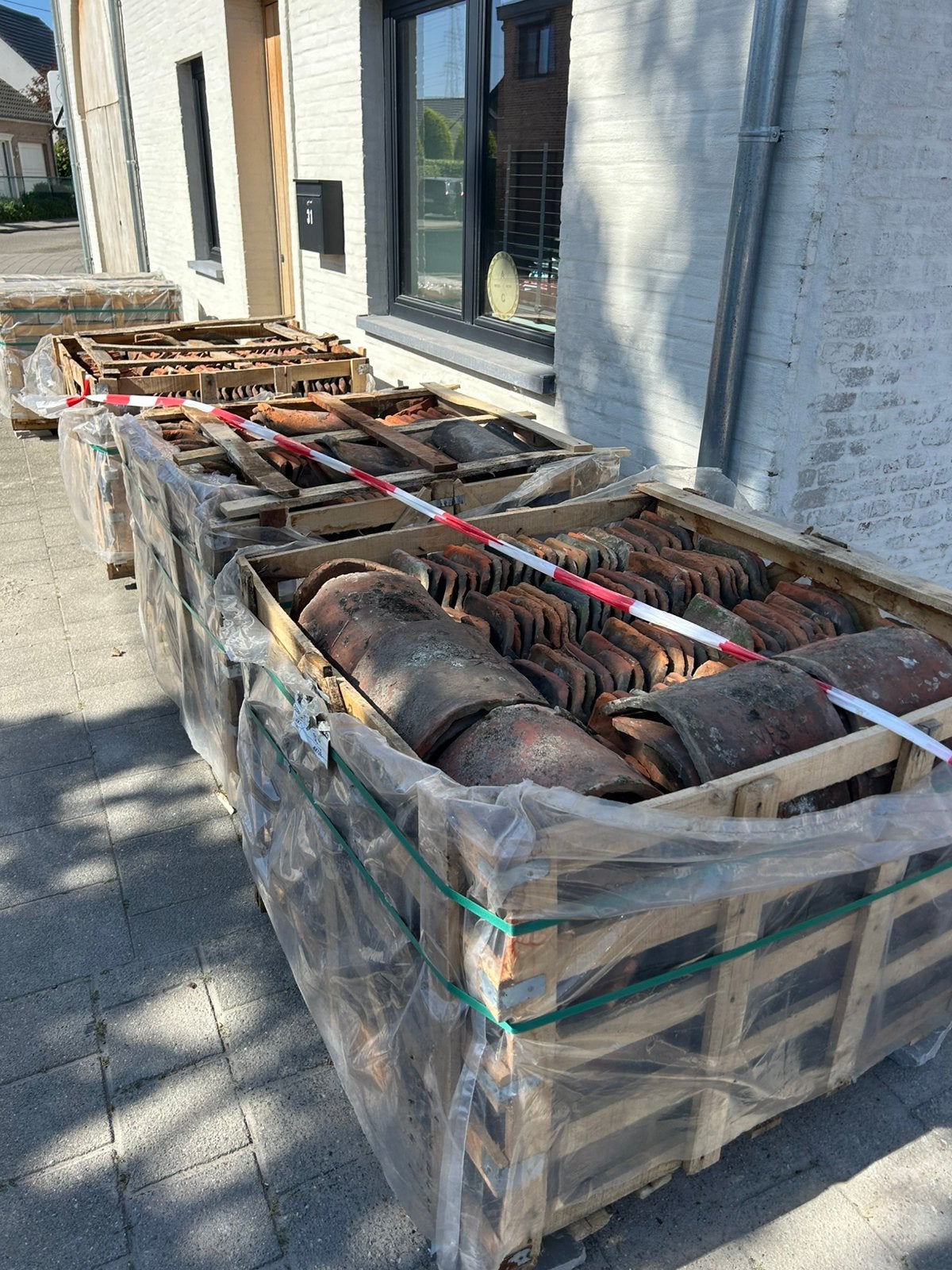 Boomse dakpannen, Enlèvement
