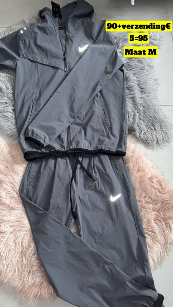 Nike trainingspak, Ophalen, Maat 48/50 (M), Zo goed als nieuw, Grijs
