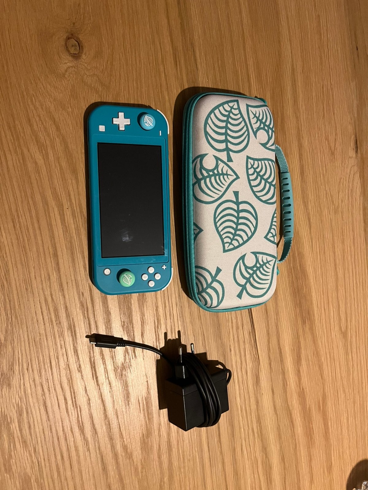 Nintendo switch lite + opberghoes en oplader, Games en Spelcomputers, Ophalen, Turquoise, Zo goed als nieuw, Met beschermhoes of tas