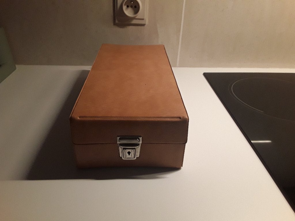 Hoesje voor videocassettes of andere, Ophalen