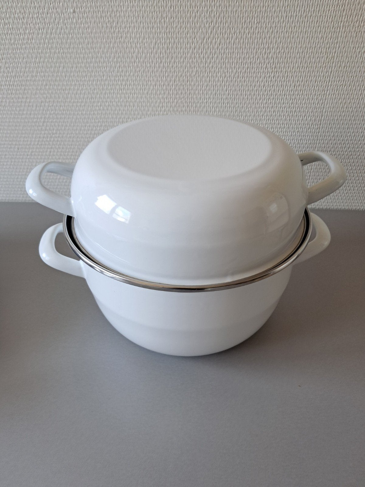 mosselpot, Ophalen